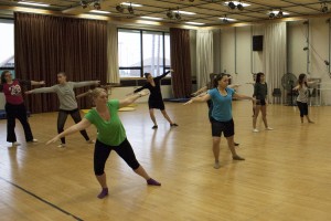 Students prepare with warm up stretches during one of the ballet courses offered in NMU’s new dancing minor for the fall 2013 semester. The minor offers more than 28 electives to choose from in courses like acting and ballroom dancing. (Anthony Viola NW)