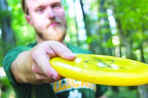 “Up here, we’ve been blessed with the beauty of the Upper Peninsula,” junior criminal justice major Cody Smith (above) said. Smith has six years of experience playing disc golf. To beginners of the sport, Smith says, “The best way to learn is to get out and experience it.”